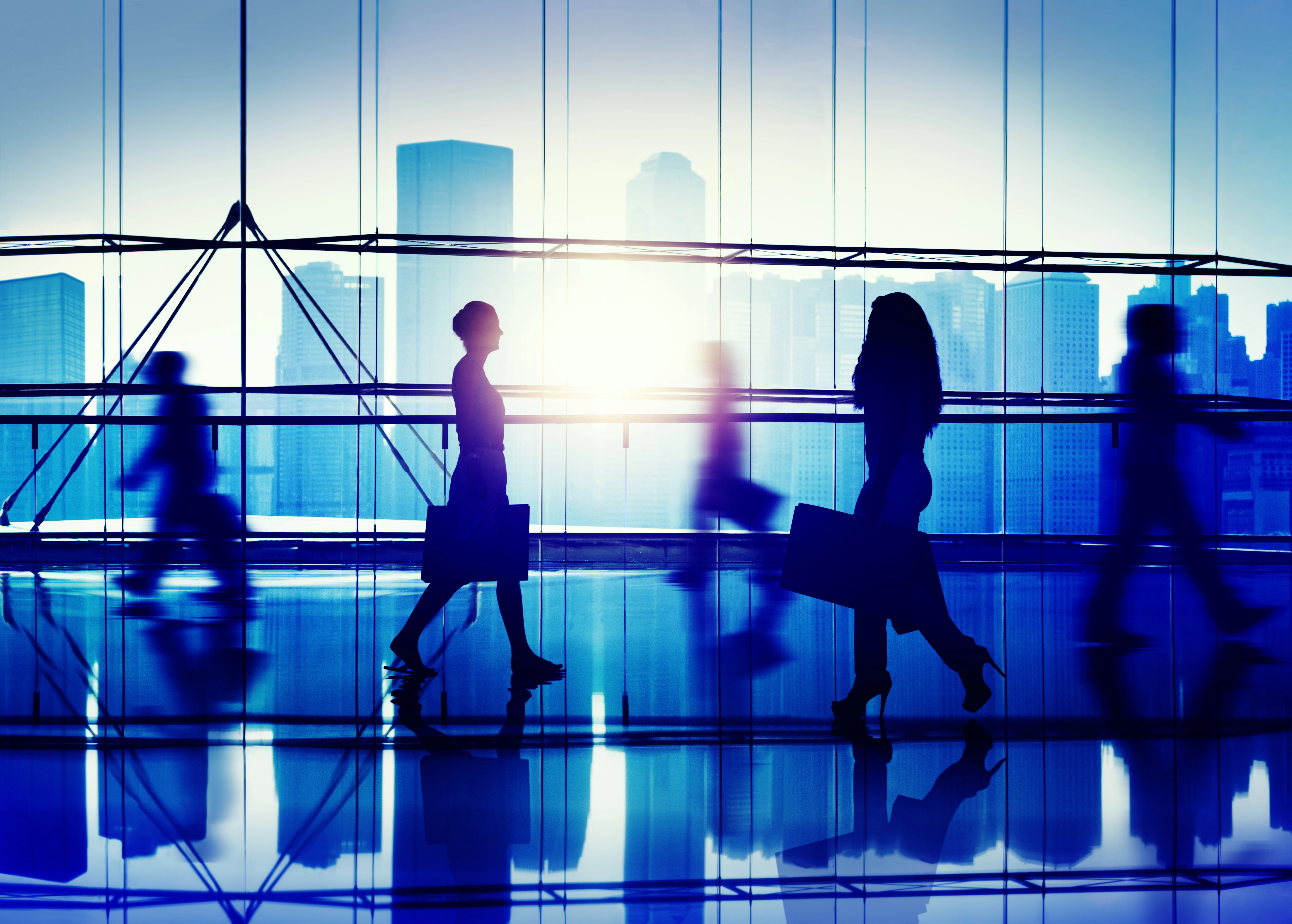 Professionals moving forward in a modern business environment